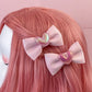 a close up of a person with pink hair