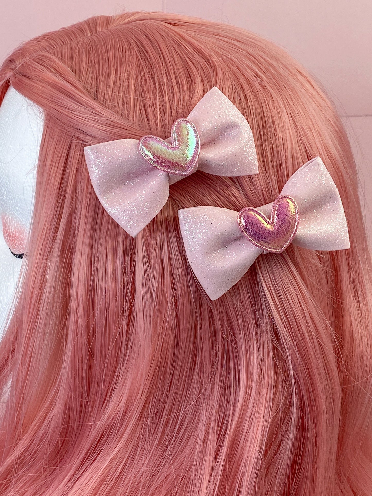 a close up of a person with pink hair