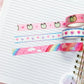 a notebook with a bunch of washi tapes on top of it