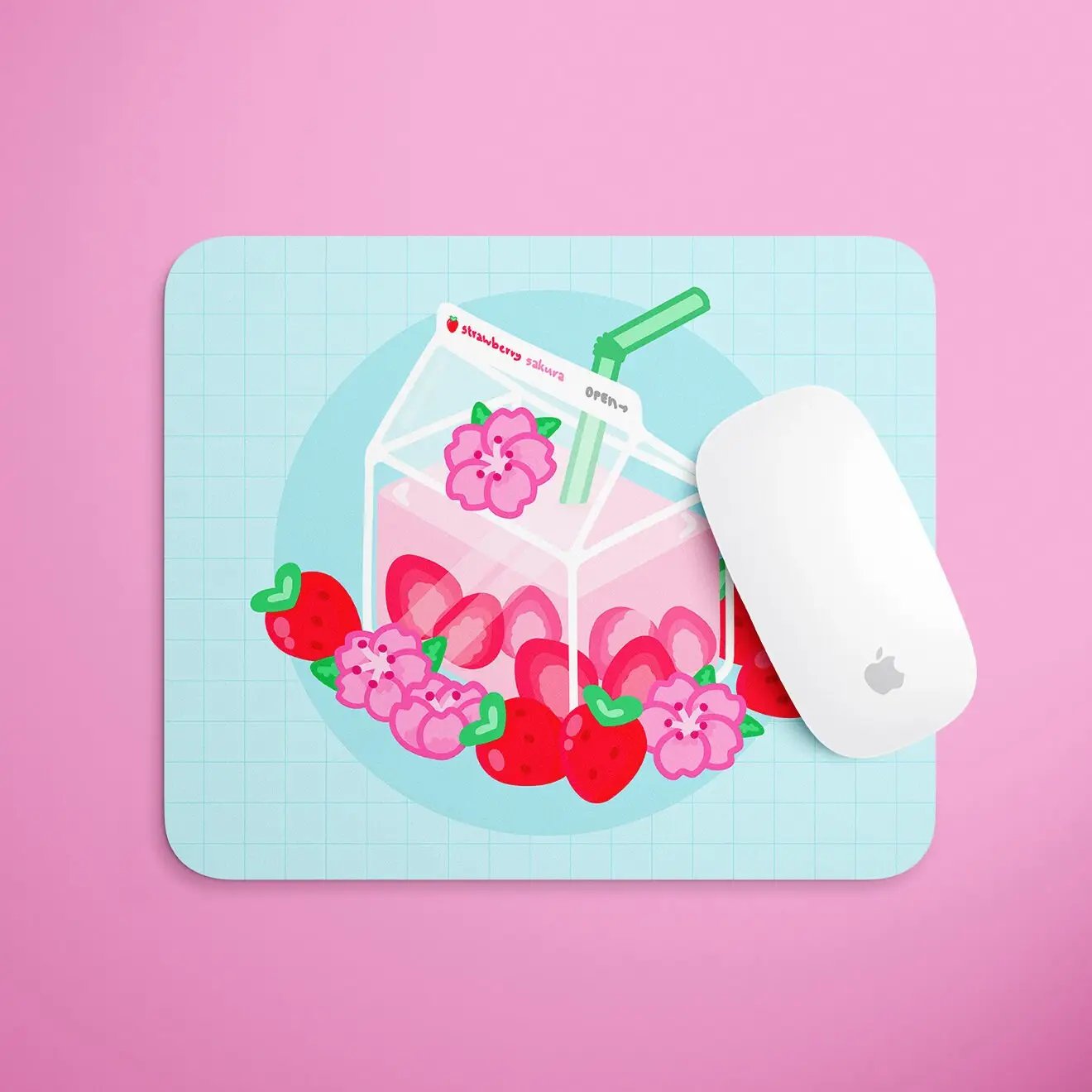 a mouse pad with a strawberry milkshake and strawberries on it