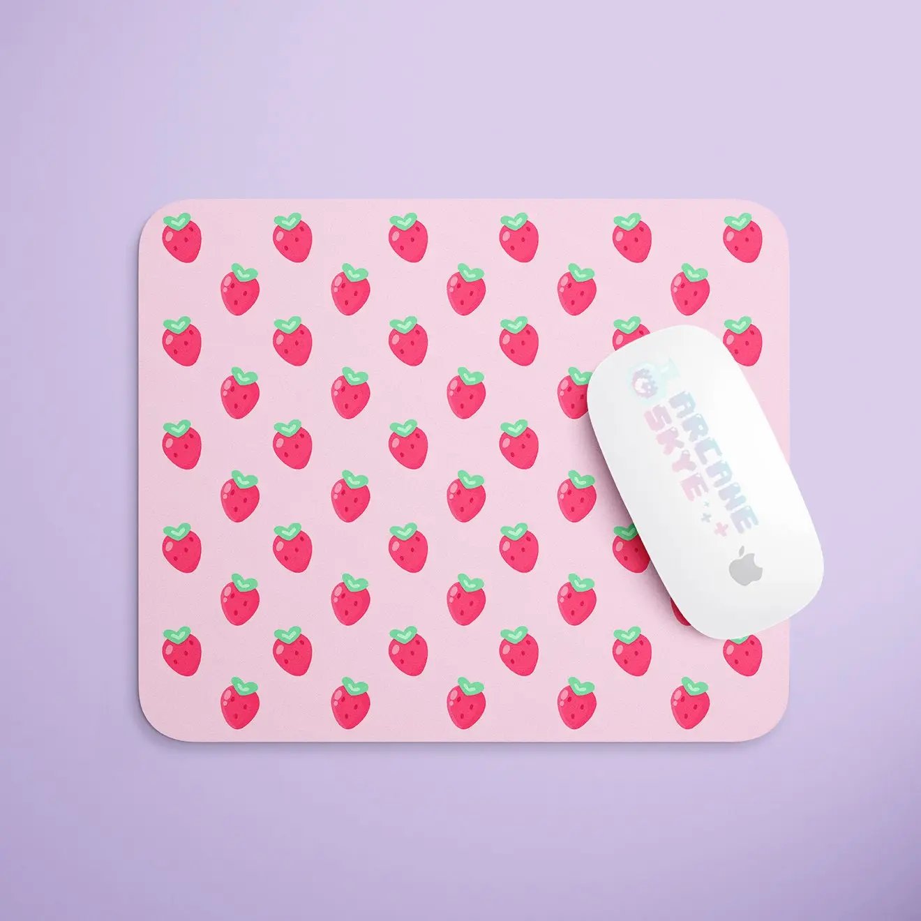 a mouse pad with a strawberry pattern on it