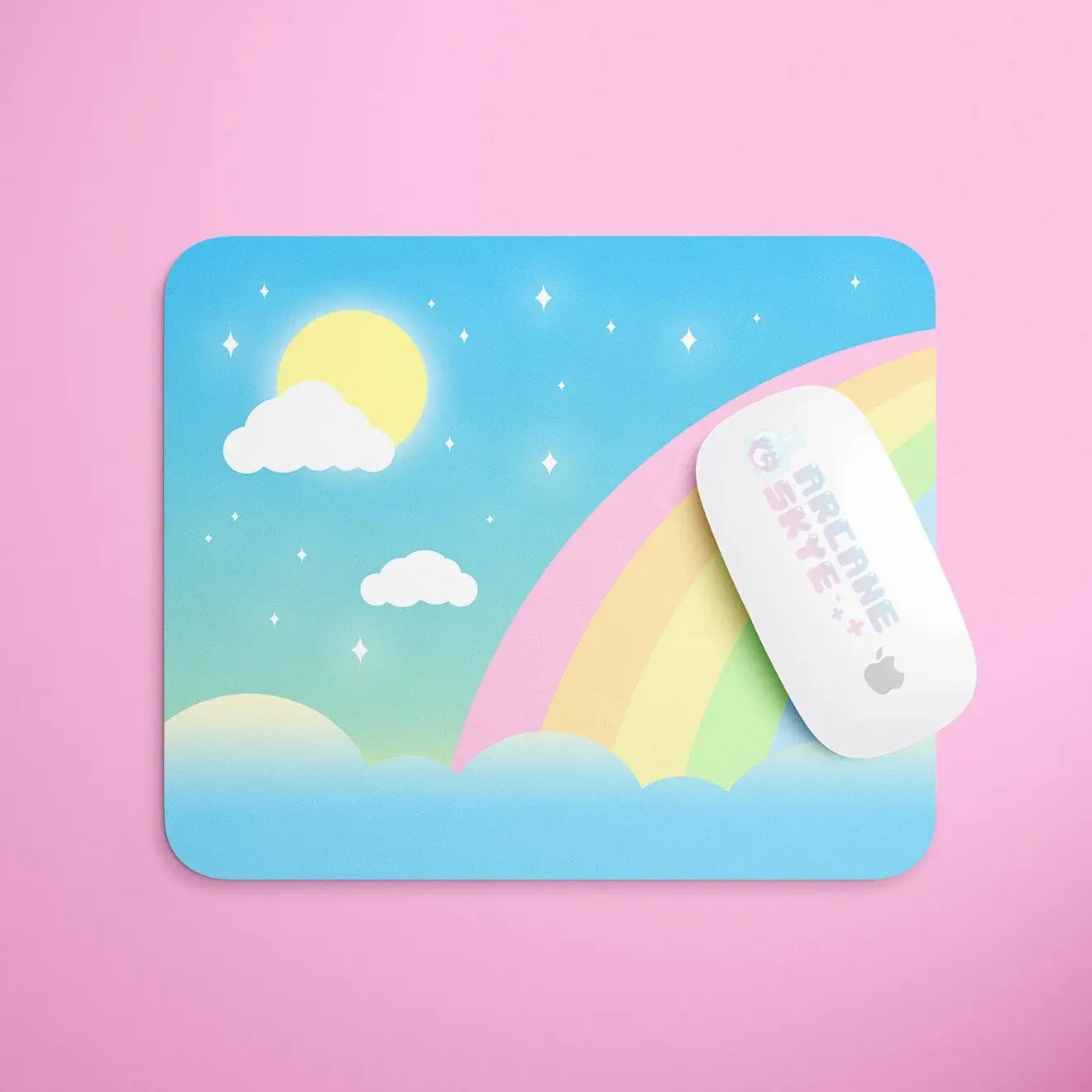 a mouse pad with a picture of a rainbow on it