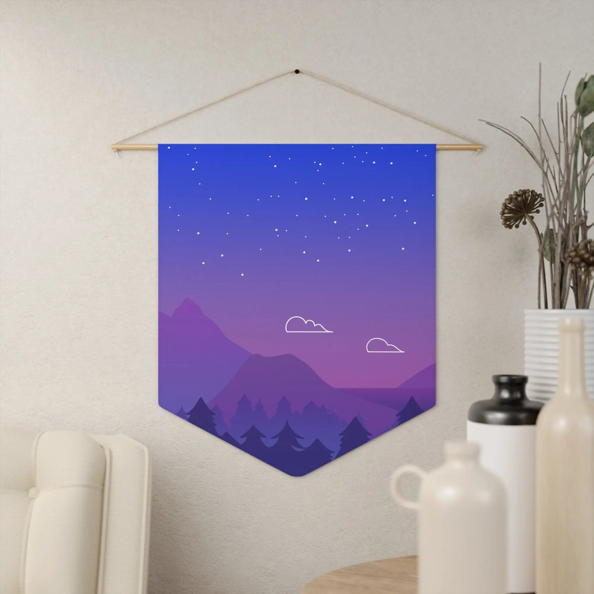 a purple and blue wall hanging over a table