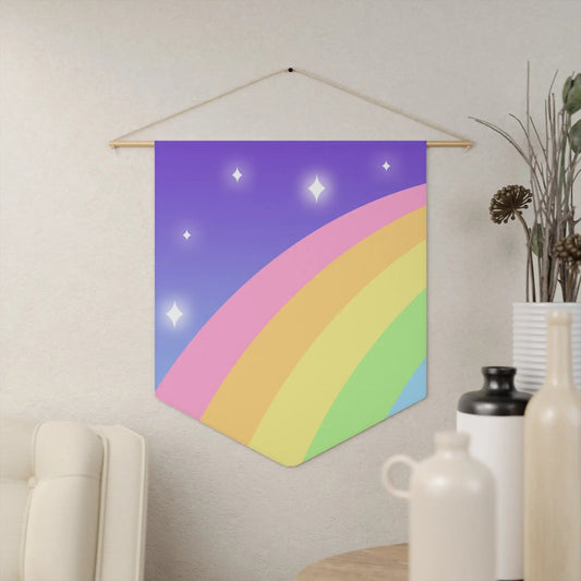 a picture of a rainbow hanging on a wall
