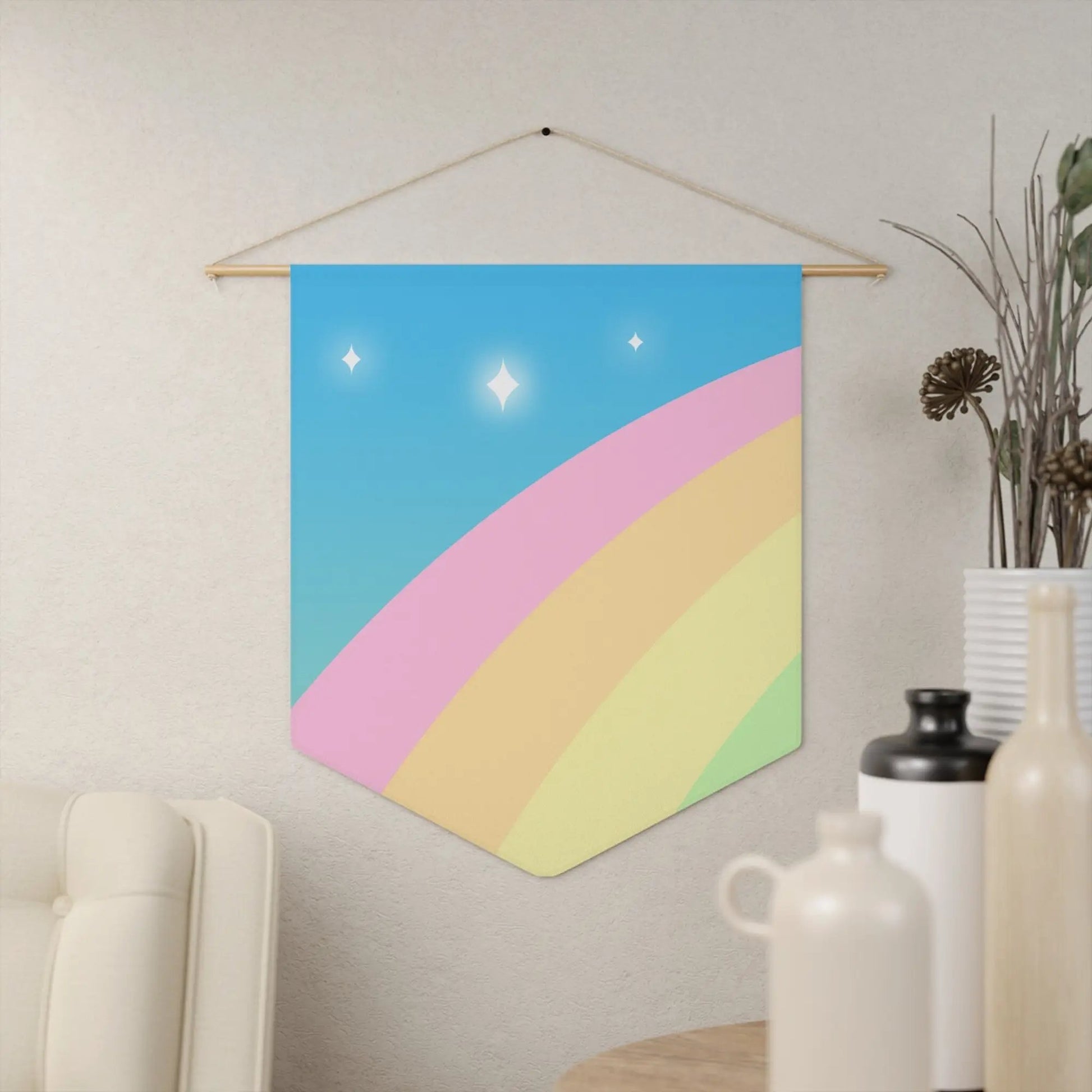 a picture of a rainbow hanging on a wall