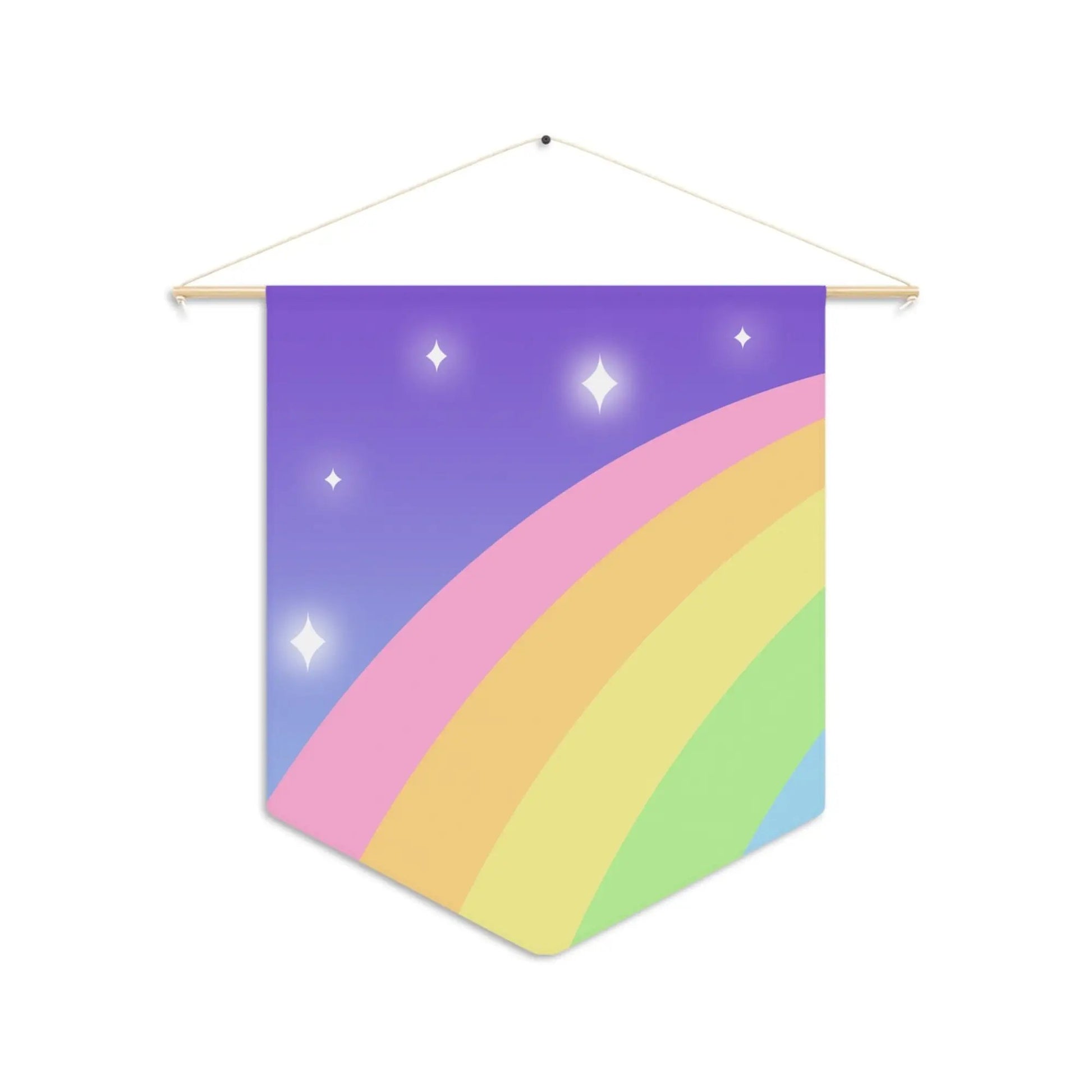 a rainbow banner hanging on a wall