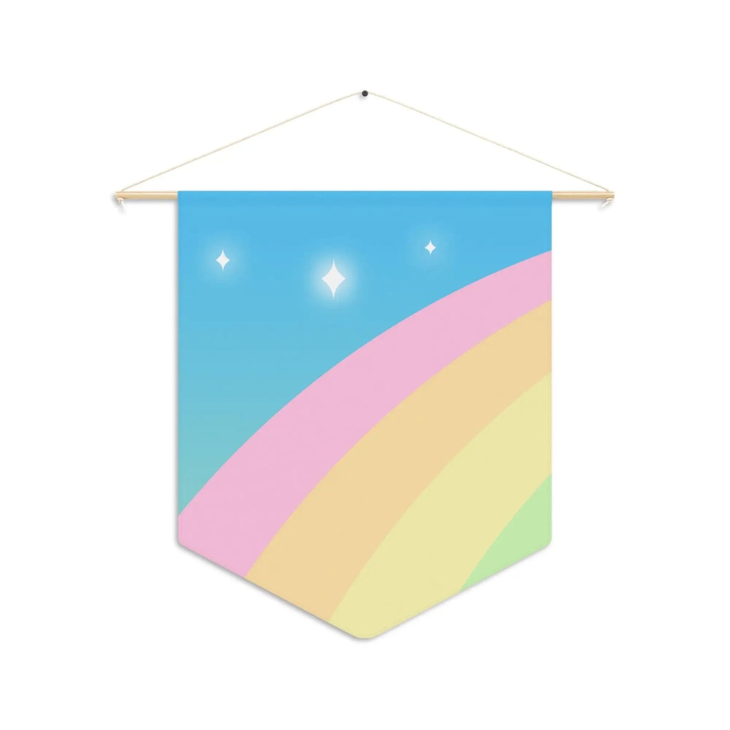 a rainbow banner hanging on a wall